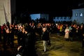 Many people with candles in their hands in the street at night Royalty Free Stock Photo