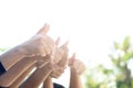 Many people congratulate a winner and holding their thumbs up Royalty Free Stock Photo