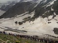 Many people doing trecking on icy mountains Royalty Free Stock Photo