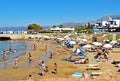 Many people enjoy a summer day at the Star Beach of Hersonissos on the island of Crete in Greece