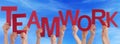 Many People Hands Hold Red Word Teamwork Blue Sky Royalty Free Stock Photo