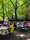 People having lunch at a biergarten at Fribourg.