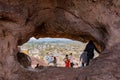 Many people hiking in the famous Hole in the Rock