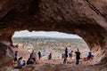 Many people hiking in the famous Hole in the Rock