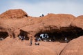 Many people hiking in the famous Hole in the Rock