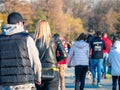 Many people out for a walk or stroll in King Mihai I Park herestrau. Busy day in the park