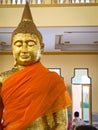 Many people pray respect Golden Buddha statue inside