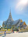 Many people pray respect Golden Buddha statue inside