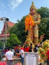 Many people praying Thao Wessuwan sculpture