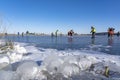 Many people are skating on a frozen lake during a sunny winter day in Zoetermeer Royalty Free Stock Photo