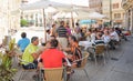 Many people and tourists eating and drinking on the terraces of the city. Zamora, Spain.