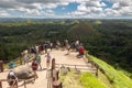 Many people tourists visit Chocolate Hills