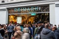 Many people waiting outside a Primark store