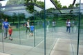 Many People Walking in a Glass Labyrinth