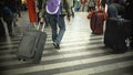 Many people walking with luggage, busy passengers at airport or Royalty Free Stock Photo