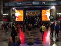 Many people walking in one of the lobbies with advertising posters of KL Sentral Station in Kuala Lumpur Royalty Free Stock Photo