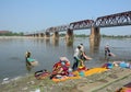 Many people washing clothes on the river Royalty Free Stock Photo