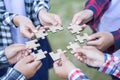 Many persons holding pieces of jigsaw puzzle,Teamwork concept,,Business connection,Success and strategy concept,Business accountin