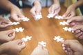 Many persons holding pieces of jigsaw puzzle,Teamwork concept,,Business connection,Success and strategy concept,Business accountin