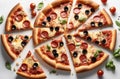 Many pieces of pizza on a white background