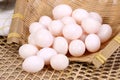 Many pigeon eggs in bamboo basket