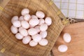 Many pigeon eggs in bamboo basket