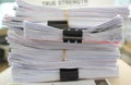 Many piles of papers on the desk Royalty Free Stock Photo