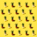 Many pineapples on a solid yellow background pattern