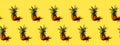 Many pineapples on a solid yellow background pattern