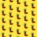 Many pineapples on a solid yellow background pattern