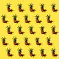 Many pineapples on a solid yellow background pattern