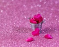 Many pink hearts in a small bucket. Blurry, not sharp background with bokeh. Valentine`s Day Royalty Free Stock Photo