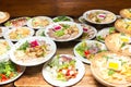 Many plates of food on the holiday table Royalty Free Stock Photo