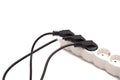 Many plugs plugged into electric power bar Royalty Free Stock Photo