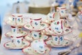 Many porcelain tea cups on flea market in Paris