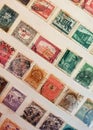 many postage stamps in a philatelic file