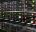 Many powerful servers running in the data center server room. Disk storage array