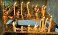 Many prayers candle flames glowing in the dark create a spiritual atmosphere