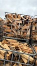 Many Prepared container firewood storage outside package store Royalty Free Stock Photo