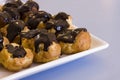 Many Profiteroles on a Plate Royalty Free Stock Photo