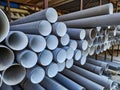 Many PVA Pipes Stacked in Building Supply Warehouse Royalty Free Stock Photo