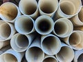 Many PVA Pipes Stacked in Building Supply Warehouse