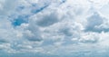 Many raining cumulus clouds are grouping up