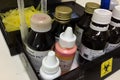 Many reagent on brown bottles in laboratory