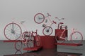 Many of red bicycle on platform with grey background