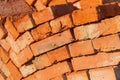 Many red bricks. The bricks is used in construction. Bricks material. Construction concept Royalty Free Stock Photo