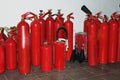 Many red fire extinguishers Royalty Free Stock Photo