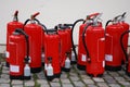 A row of fire extinguishers Royalty Free Stock Photo