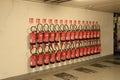 many red Fire Extinguishers at a wall Royalty Free Stock Photo
