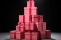 many red and pink gift boxes with a bow on dark black background Royalty Free Stock Photo